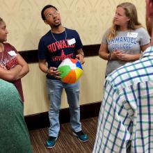 A group of students standing in a circle